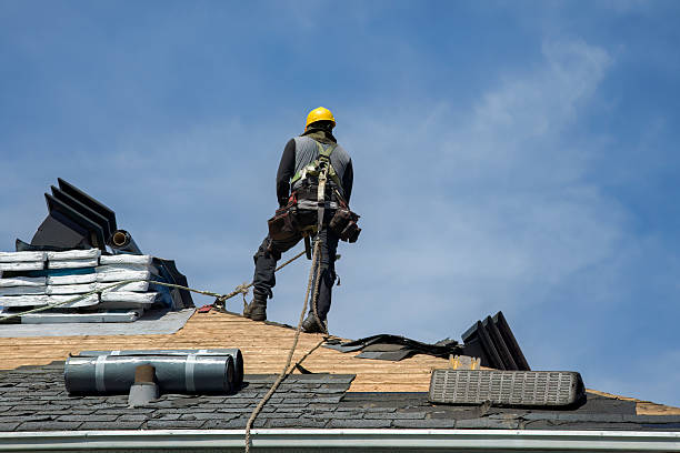 Professional Storm Damage Roof Repair technician working in Clarendon, TX